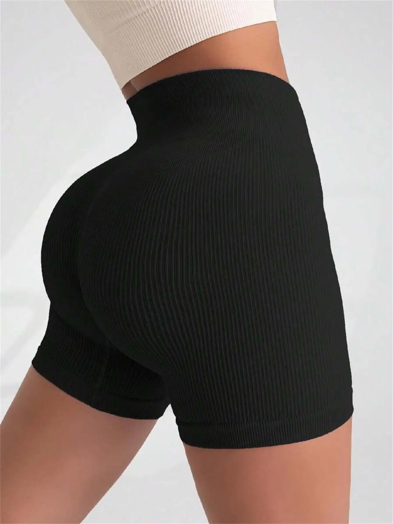 Calça de ioga de cintura alta, projetada para levantar e modelar, com ajuste justo